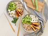foto ricetta Bowl estiva di riso e cereali, feta, pesche, fave, menta 