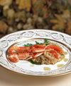 RISOTTO AU CITRON ET GAMBAS ACCOMPAGNÉ DE ROQUETTE SAUVAGE 