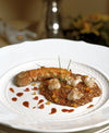 RISOTTO CON PIMIENTOS, ESTURIÓN, GAMBAS Y RÚCULA 