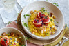 Risotto Milanese mit gefüllten Ricotta-Tomaten und Macadamia-Nüssen 
